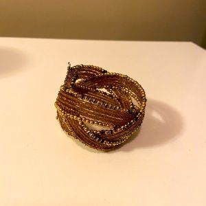 Golden and brown colored wrap bracelet